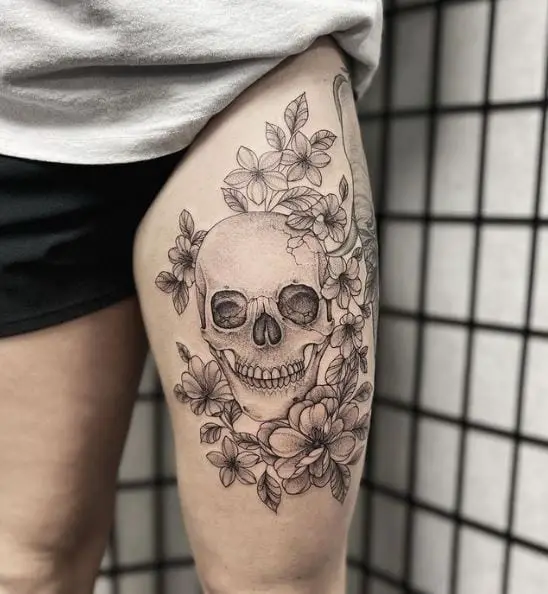 Skull with Flowers Thigh Tattoo