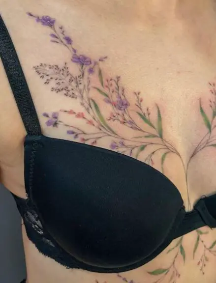 Small Flowers, Vines, Leaves and Other Floral Breast Tattoo