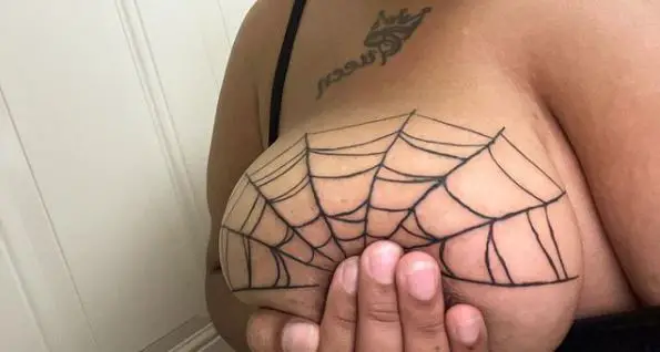 Spider Web Breast Tattoo