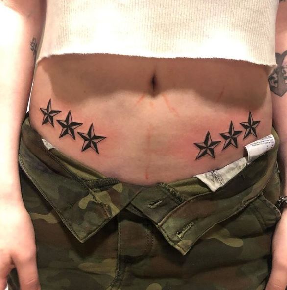 Symmetrical Nautical Stars Tattoo on the Front Hip