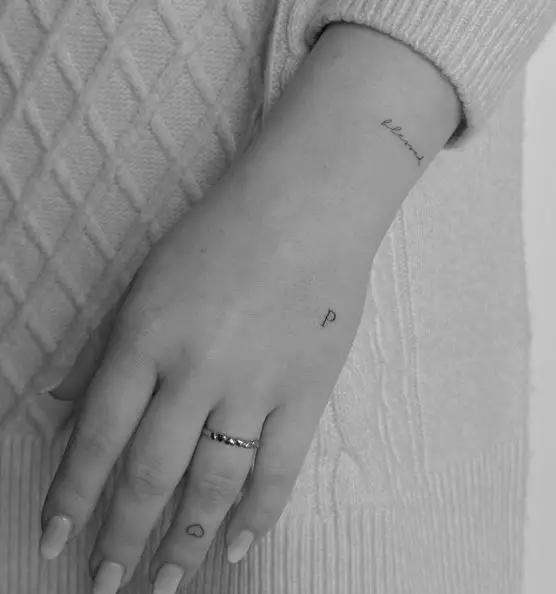 Tiny Letters and Heart Symbol Tattoo