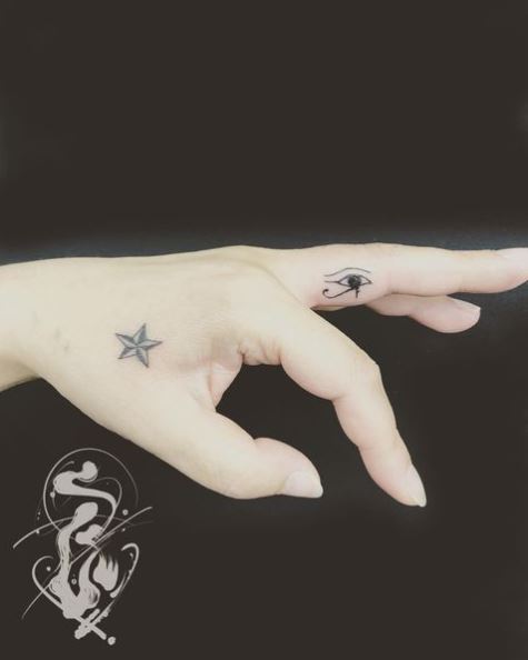 Tiny Nautical Star Tattoo