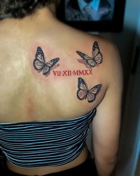 Triple Butterfly Tattoo with Shadow and Roman Numerals Upper Back Tattoo
