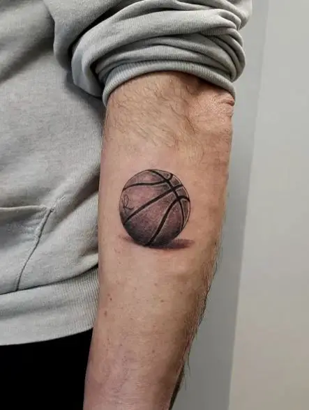 Black and Grey Realistic Basketball Forearm Tattoo