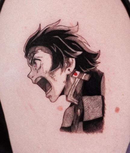 Black and Grey Yelling Demon Slayer Tanjiro Arm Tattoo
