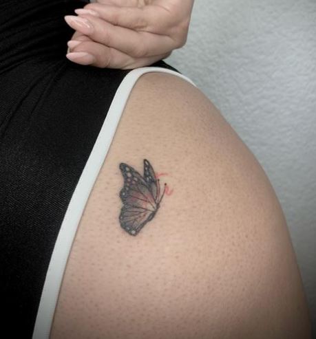 Grey Shaded Butterfly Butt Tattoo