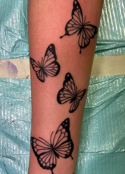 Black and White Butterflies Forearm Sleeve Tattoo