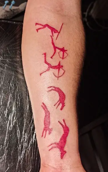 Animals and Ancient Hunters with Bows and Spears Forearm Tattoo