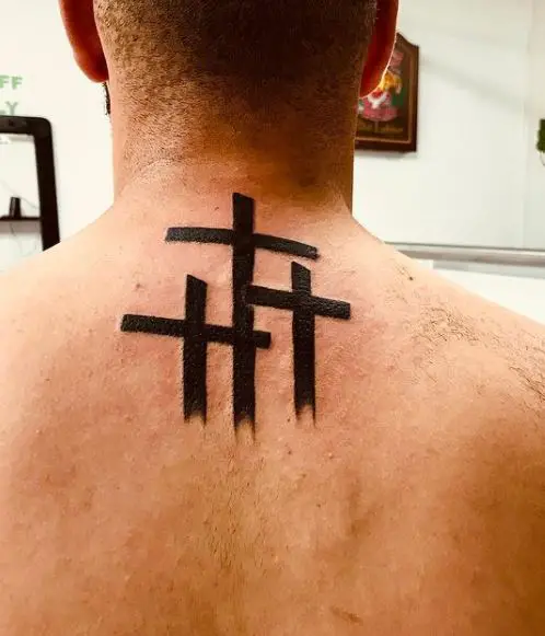 Black Bold Three Cross Back Tattoo