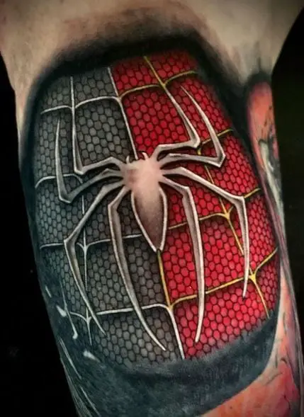 Blue and Red Piece of Spiderman Suit Leg Tattoo