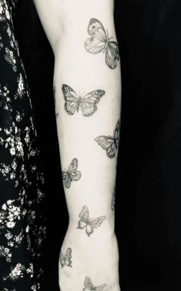 Black and Grey Flying Butterflies Forearm Tattoo