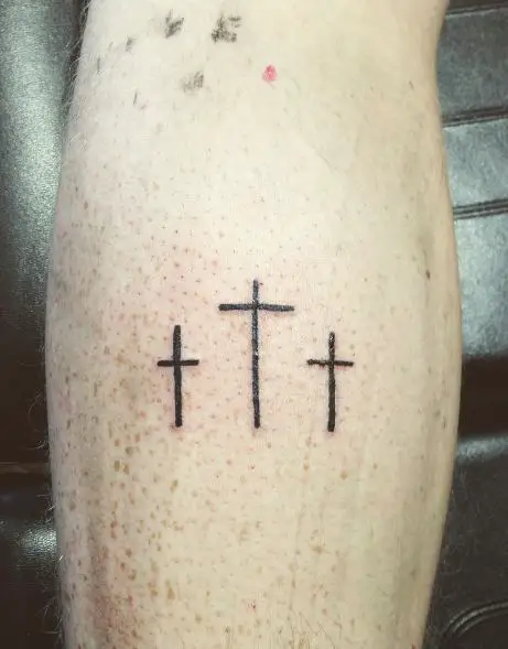 Black Thin Three Cross Back Tattoo