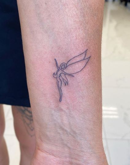 Grey Minimalistic Fairy Wrist Tattoo