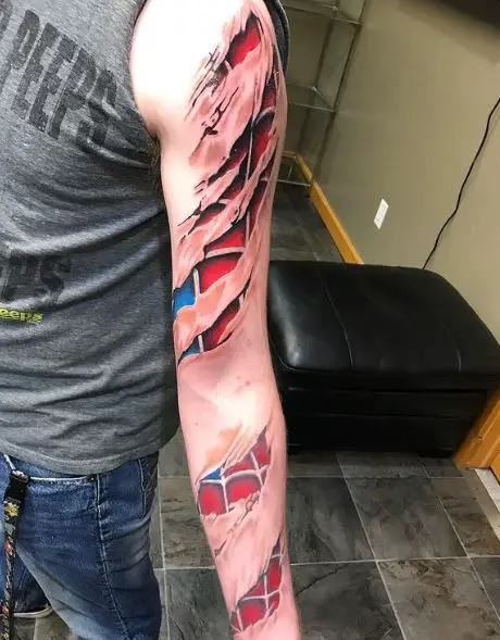 Teared Skin and Spiderman Suit Arm Tattoo