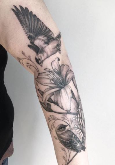 Black and Grey Lilies and Birds Forearm Tattoo