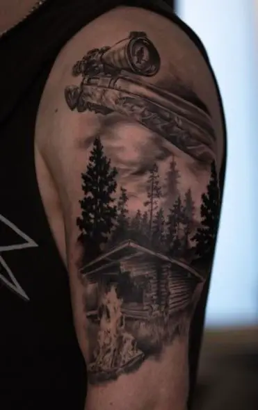 Forest Landscape and Hunting Rifle Arm Tattoo