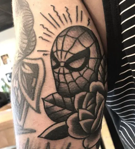 Black and Grey Flower and Spidey Sense Arm Tattoo