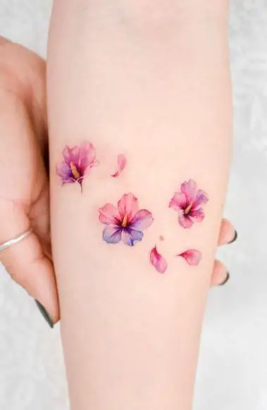 Pink and Violet Hibiscus Forearm Tattoo