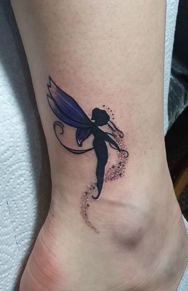 Black Shadow Fairy with Violet Wings and Fairy Dust Ankle Tattoo