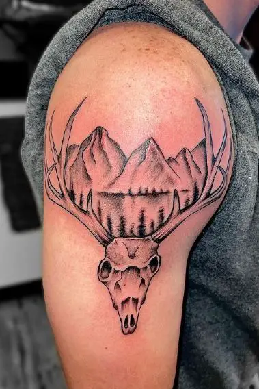 Mountain Landscape and Deer Skull with Horns Arm Tattoo