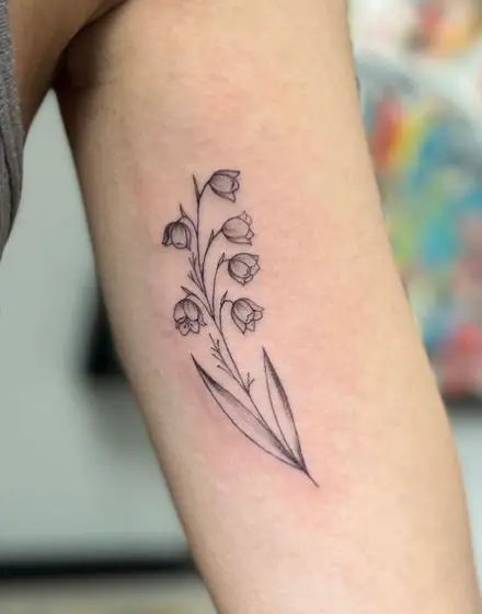 Black and Grey Lily of the Valley Biceps Tattoo
