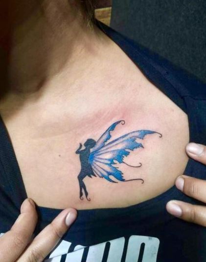 Black Shadow Fairy with Blue Wings Collarbone Tattoo