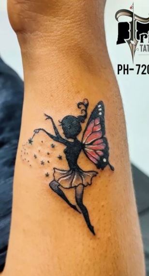 Black Shadow Fairy with Pink Wings and Fairy Dust Forearm Tattoo