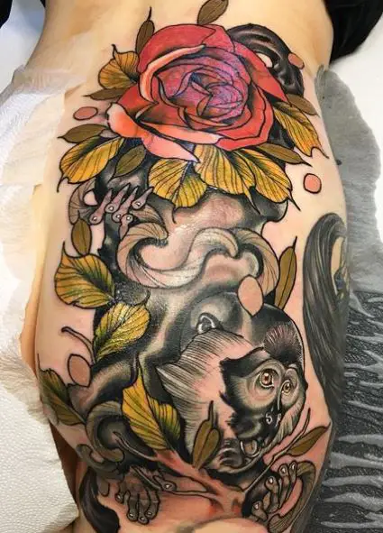 Colorful Flower and Monkey Butt Tattoo