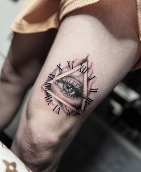 Clock and All Seeing Eye Thigh Tattoo