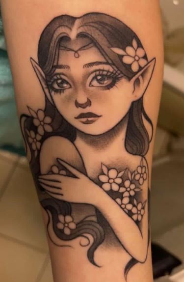 Black and Grey Fairy with Flowers Forearm Tattoo