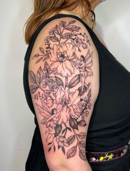 Black and Grey Snapdragons and Fairies Arm Tattoo