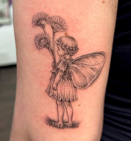 Black and Grey Daisies and Fairy Arm Tattoo