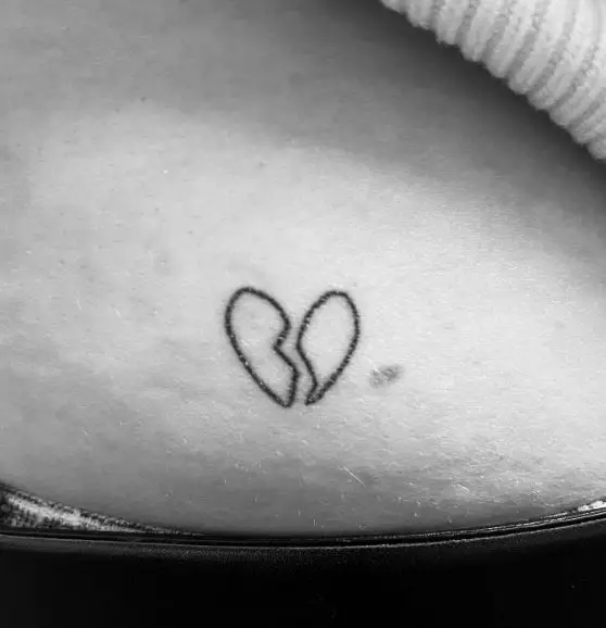 Minimalistic Broken Heart Butt Tattoo