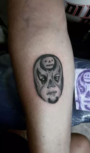 Minimalistic Lucha Libre with Pumpkin Arm Tattoo