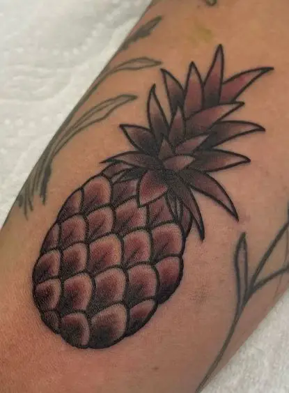Brown Pineapple Arm Tattoo