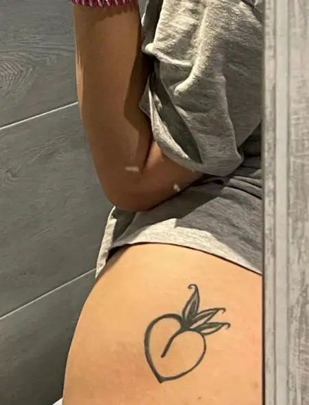 Grey Peach Butt Tattoo