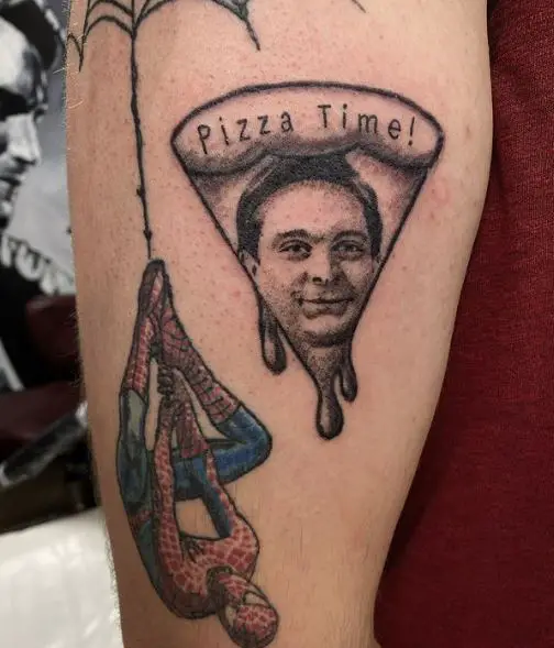 Tobey Maguire Head and Upside Down Spiderman Arm Tattoo