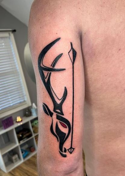 Black Deer Head and Arrow Arm Tattoo
