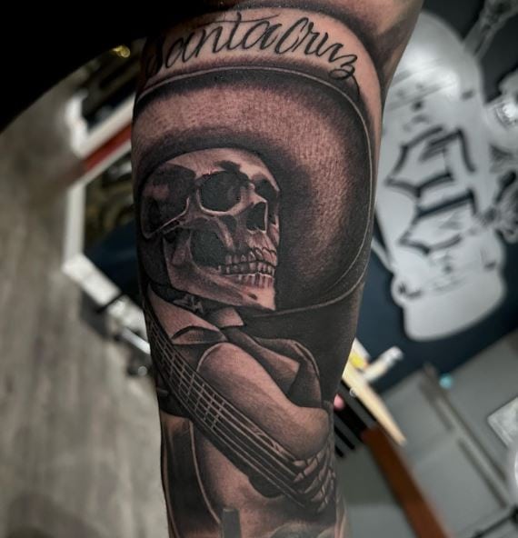 Black and Grey Mariachi Skeleton Forearm Tattoo