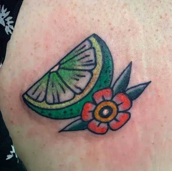 Colored Flower and Lime Butt Tattoo