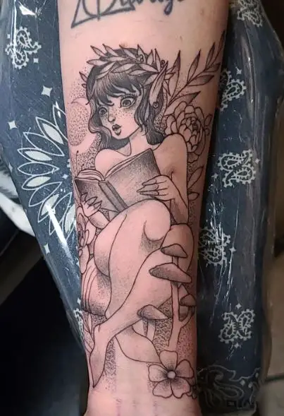 Mushrooms and Fairy Reading Book Forearm Tattoo