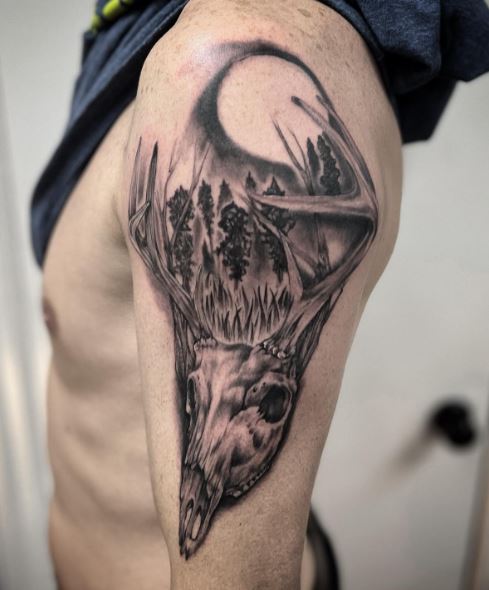 Black and Grey Forest and Deer Skull Arm Tattoo
