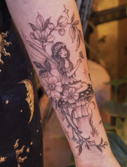 Mushroom and Fairy with Flowers Forearm Tattoo