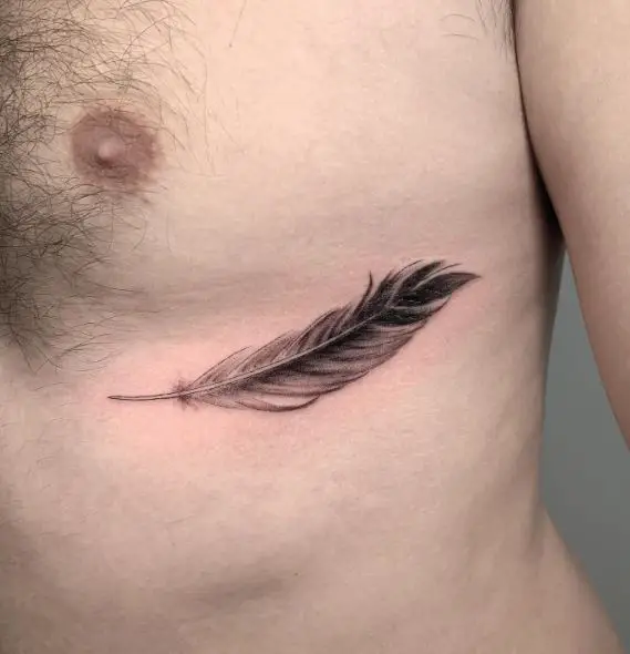Black and Grey Feather Ribs Tattoo