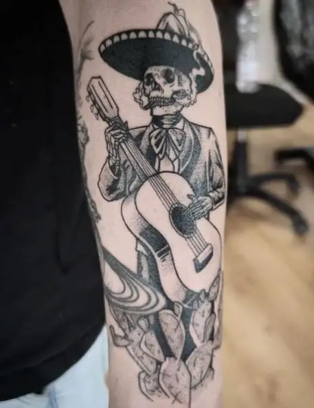 Mariachi Skeleton Playing Guitar Forearm Tattoo