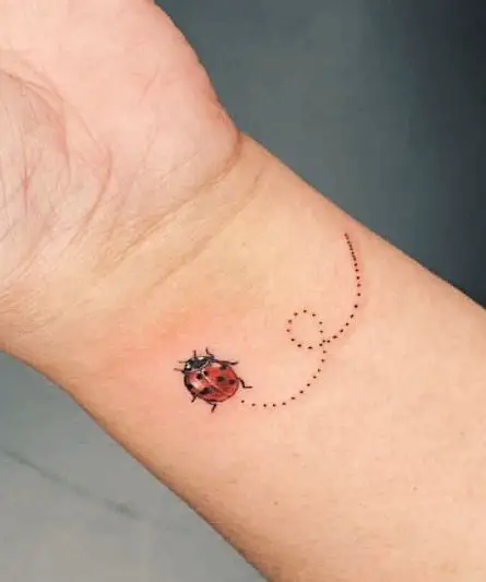 Colorful Ladybug with Trail Wrist Tattoo