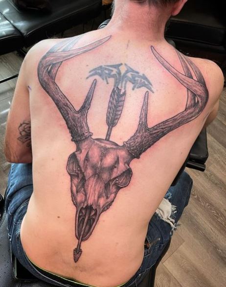 Arrow through Deer Skull Back Tattoo