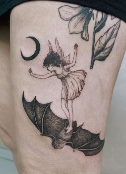 Black and Grey Half Moon and Fairy with Bat Thigh Tattoo