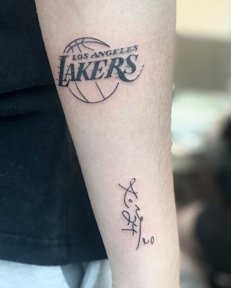 Black Lakers Logo Forearm Tattoo