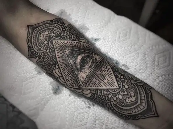 Geometric Ornament and All Seeing Eye Arm Tattoo